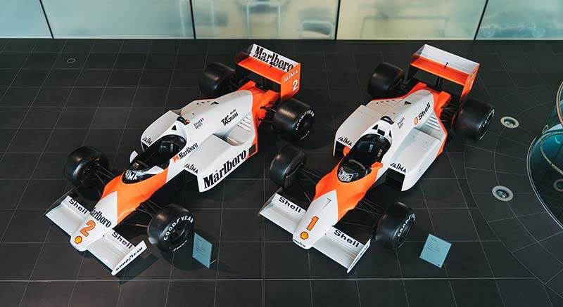 Overhead view of Alain Prost’s Drivers’ World Championship and Constructors’ winning 1985 MP4/2B and 
Alain Prost’s Drivers’ World Championship winning 1986 MP4/2C on display at the McLaren Technology Centre Boulevard